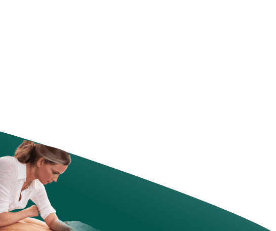 Woman performing massage therapy on man